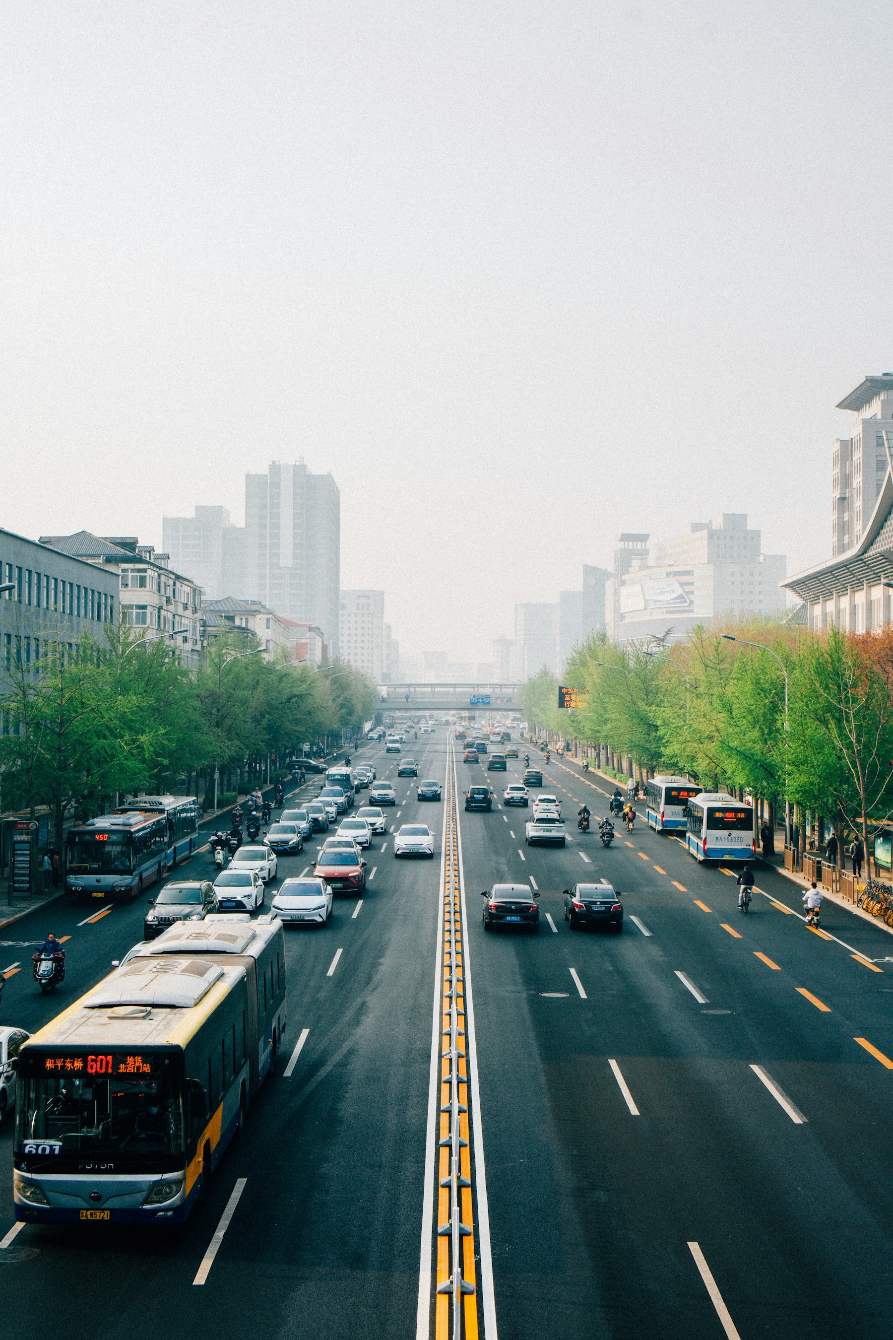 Traffic on a hazy city road in Beijing